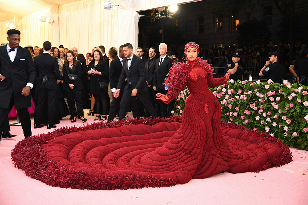 Cardi B wearing Thom Browne / Getty.