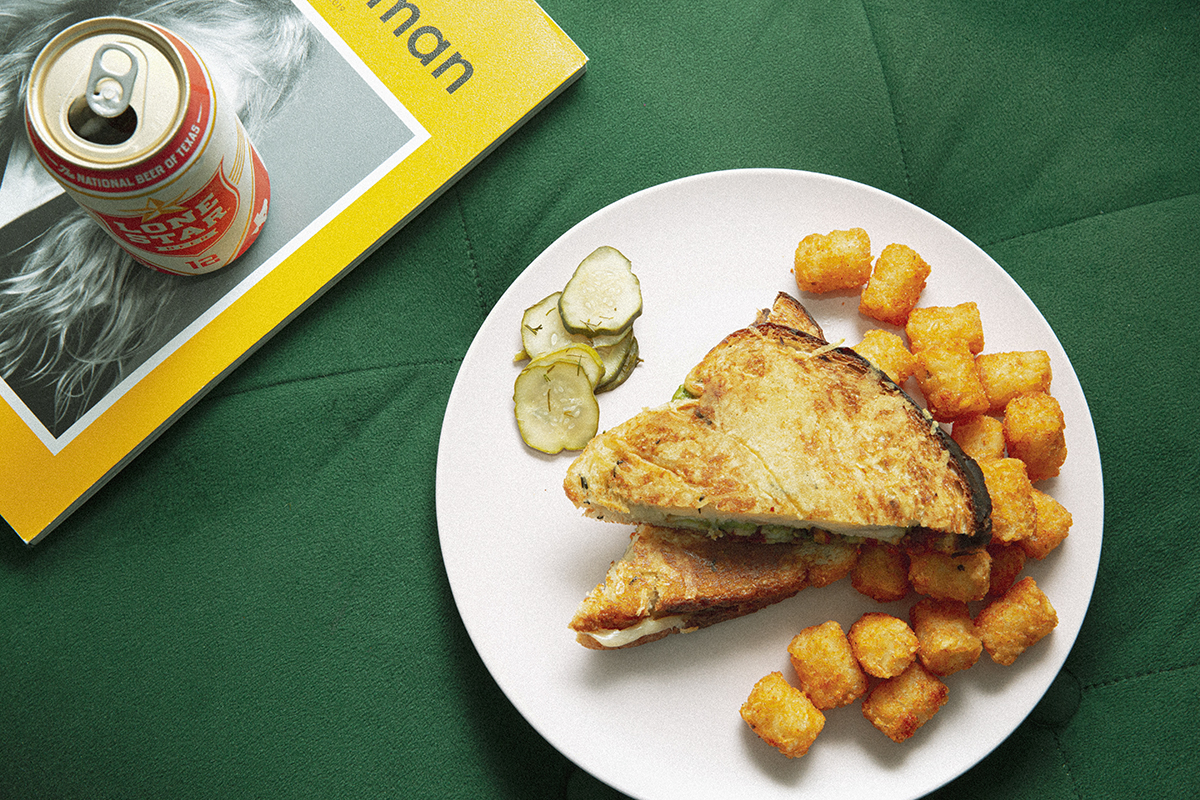 Turkey di Parma Grilled Cheese Sandwich with a side of Tots.