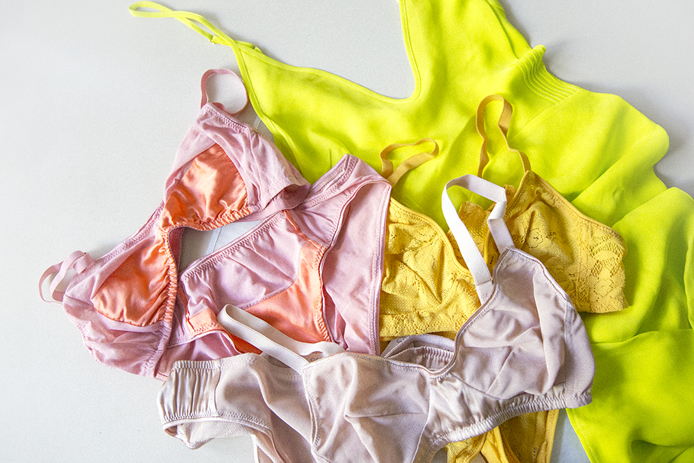 Cadel Slip in chartreuse. Tamara Bralette and Tris Panty in Marigold. Yanelis Bralette and Liselott Panty in Petal. Tasia Bralette and Tove Panty in Buff.